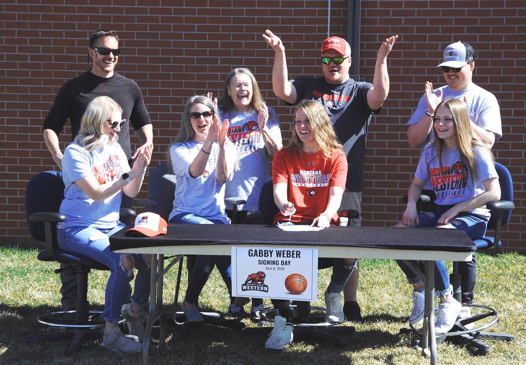 Gabby Weber signs